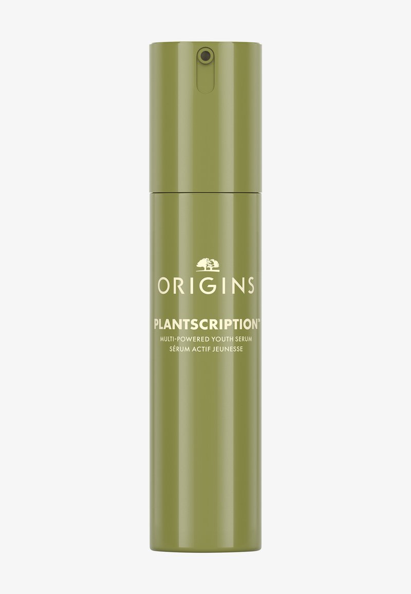 Botella cilíndrica verde de suero con texto blanco que dice "ORIGINS PLANTSCRIPTION™ SUERO JUVENIL MULTIPODER" y un dosificador en la parte superior.