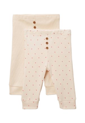 Deux paires de leggings beige pour bébé, une avec de petits cœurs roses et trois boutons marron sur la ceinture devant, l'autre unie avec deux boutons.