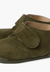 Pisamonas UNISEX zielony
