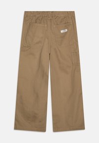 Brown wide-leg trousers with an elastic waistband, two back pockets, and a side pocket. Made of durable fabric with a smooth texture.