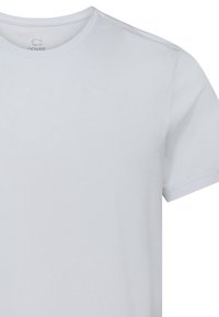 Hvid kortærmet t-shirt i bomuld med rund halsudskæring og glat tekstur. Har et logo trykt inden i kraven.