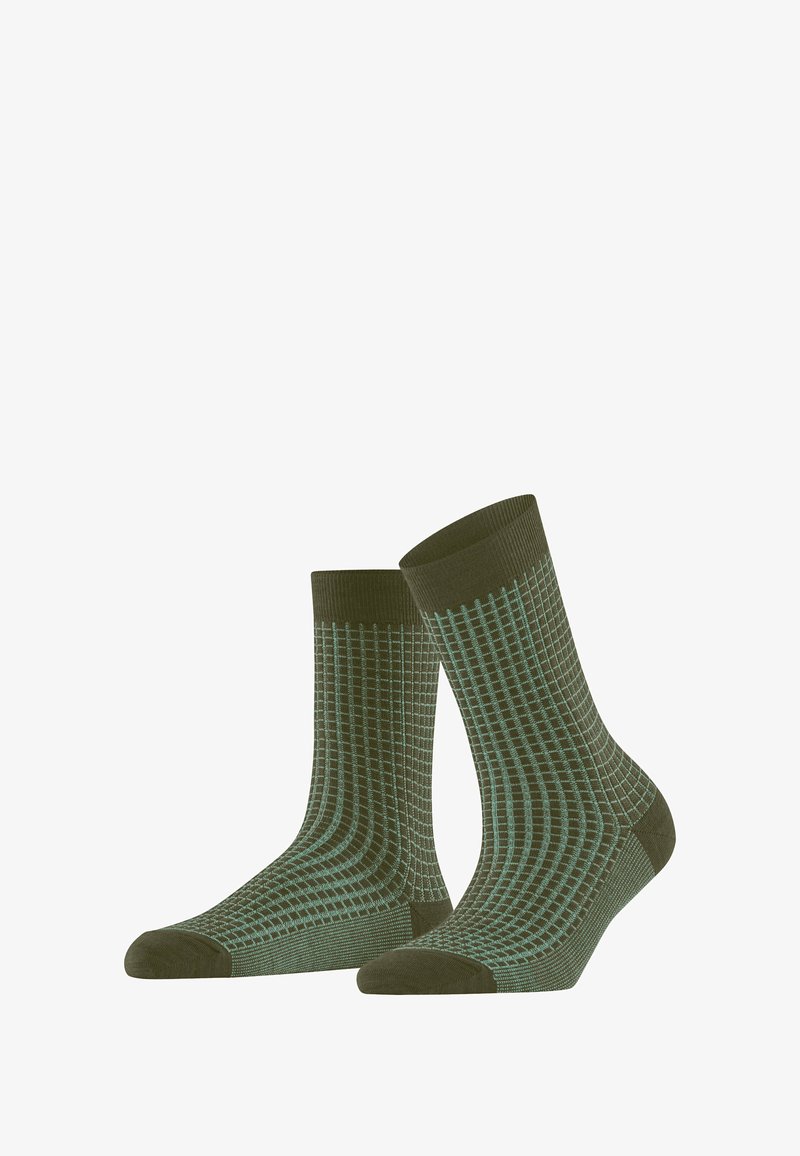 Calze verde oliva con un motivo a griglia in blu chiaro. Fascette a coste e punta rinforzata. Il materiale sembra morbido con una texture liscia.