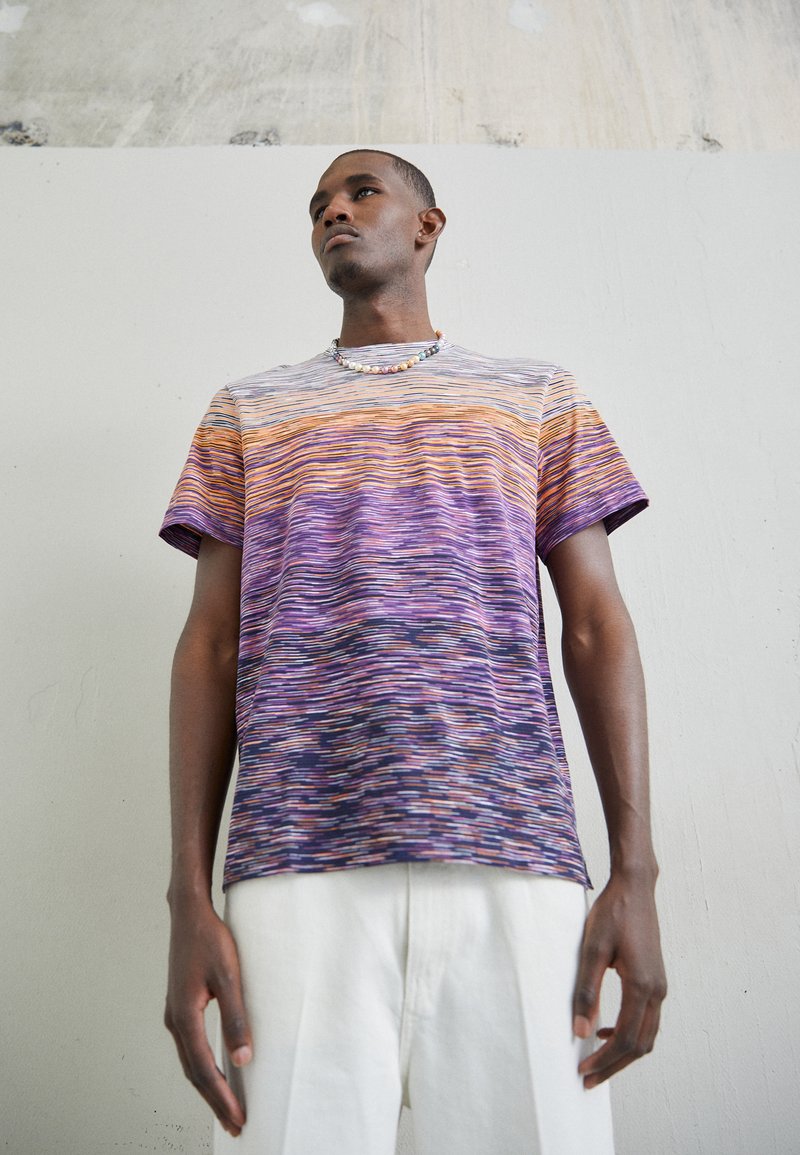 T-shirts de luxe et hauts pour femme signés
