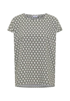 Blouse à manches courtes avec encolure ronde et motif géométrique vert et noir répétitif sur fond blanc.