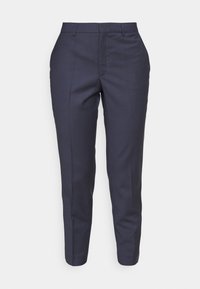 Pantalons taillés bleu marine avec une texture lisse, coupe slim et pli central. Comprend des passants de ceinture et une fermeture à glissière.