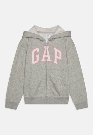 Sweat à capuche gris zippé avec lettrage GAP blanc contouré de rose sur le devant et une poche avant sous la fermeture éclair.