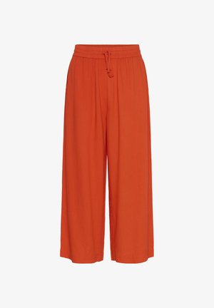 Orange vida byxor med elastisk midja och justerbar dragsko. Tillverkade av lätt tyg med en slät textur.