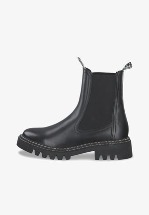 Black leather ankle boots with elastic side panels, pull tabs, and a rugged sole featuring a thick tread and contrasting white stitching.