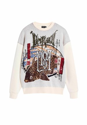 Sweatshirt à col rond couleur crème avec un graphisme de poisson texturé et des caractères japonais colorés. Dispose de manches longues et d'une coupe décontractée.