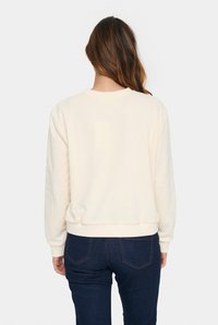 Saint Tropez ZADI - Mikina - pearled ivory tigerlily hart