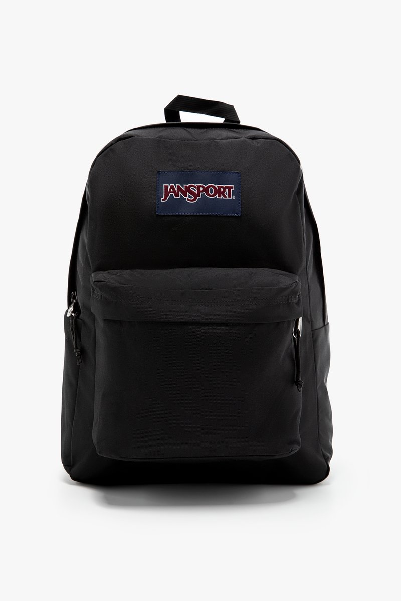 Sac à dos Jansport noir, fabriqué en tissu durable, comporte une poche avant, des bretelles ajustables et une forme rectangulaire avec un patch logo.