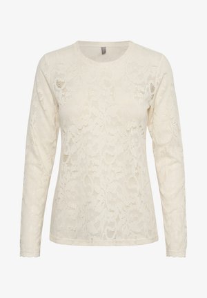 Długi rękaw, koronkowa bluzka w kolorze kremowym, z kwiatowymi wzorami, okrągłym dekoltem oraz falbaniastymi wykończeniami przy mankietach. Miękka, półprzezroczysta tekstura.