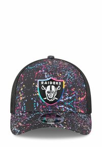Black cap featuring a colorful splatter pattern. Includes a Raiders logo patch on the front. Curved visor, adjustable fit.