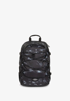 Sort og grå marmorprint rygsæk med front elastiske snore, topgreb, sidelommer og Eastpak-logo på den nederste forlomme.
