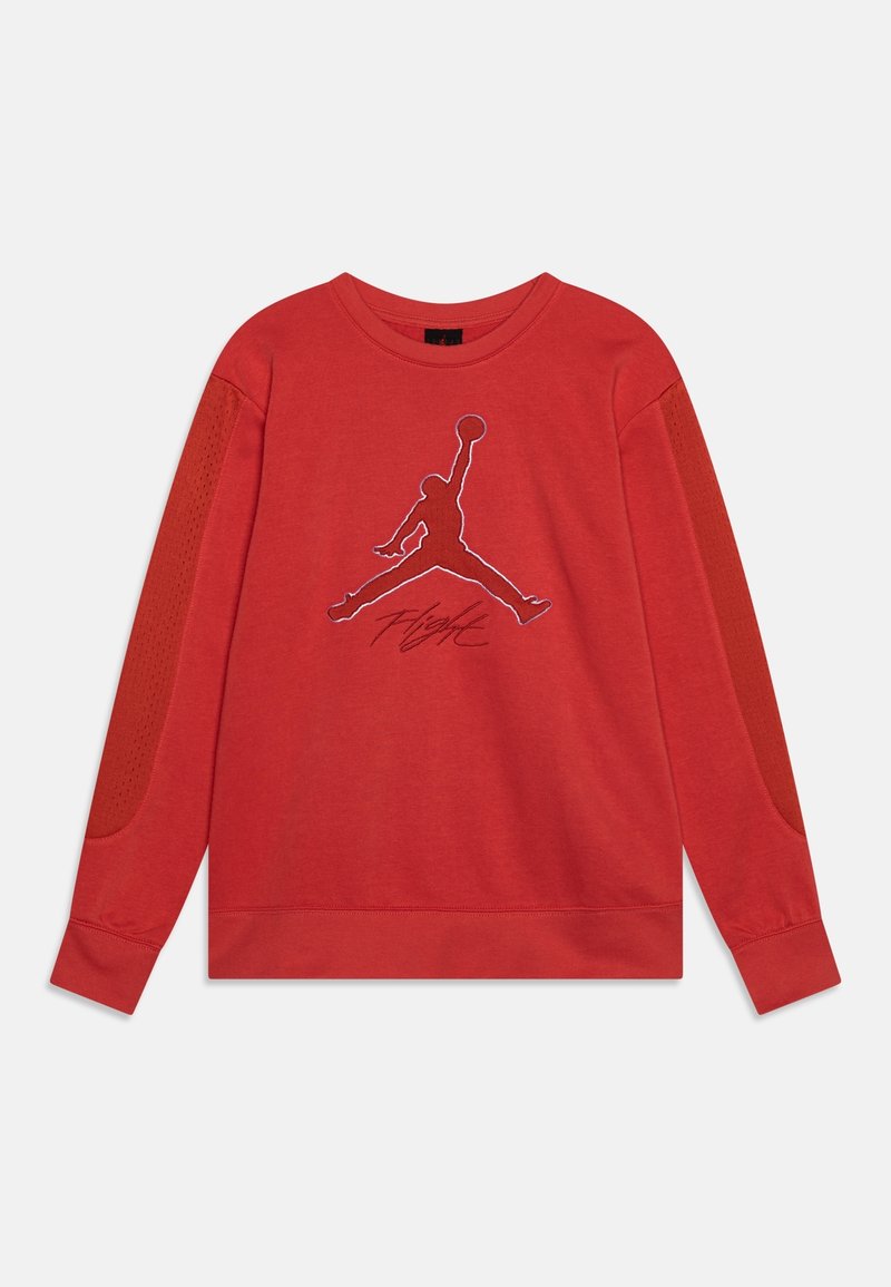 Sweat-shirt rouge à manches longues avec des panneaux en maille sur les manches, présentant une grande silhouette cousue d'un joueur de basketball et le mot "Flight" en dessous.