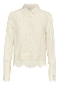 Cremefarvet bluse med lange ærmer, spidse kraver og knaplukning, med blonder ved kanten og ærmerne for ekstra tekstur.