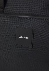 Calvin Klein ESSENTIAL LAPTOP BAG - Portfelis - black