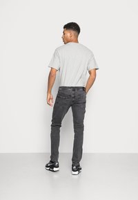 Pepe Jeans HATCH - Calças de ganga justas - grey denim