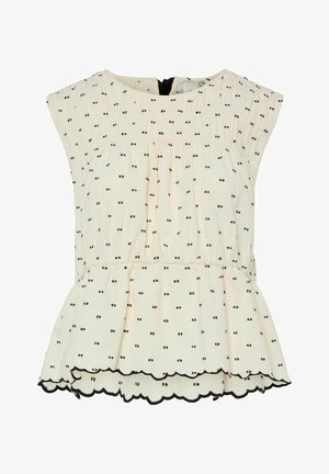 Kremfarget topp med korte ermer og svart prikkemønster, samlet midje og bølget kant. Baklukk med glidelås, lett stoff.