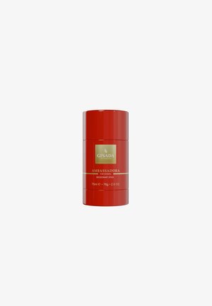 Bâton déodorant rouge étiqueté « Gisada Ambassadora pour Femmes », 75 ml, 76 g, 2,6 oz, avec texte en or et blanc sur le devant.