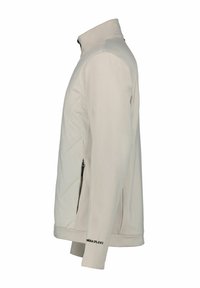 Lysegrå softshelljakke med høj krave, lynlåslommer i siden og elastiske manchetter. Har rene linjer og et minimalistisk design.