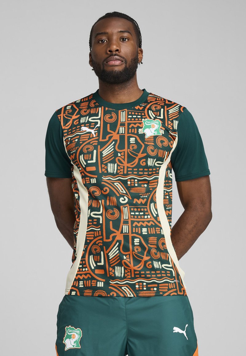 Puma - IVORY COAST FIF PREMATCH JERSEY - Maillot de foot - dark myrtle rickie orange, Agrandir