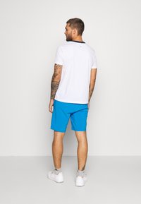 Fila SHORTS SANTANA - Träningsshorts - simply blue