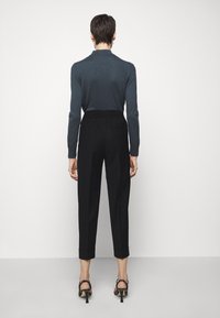 Filippa K Tygbyxor - black