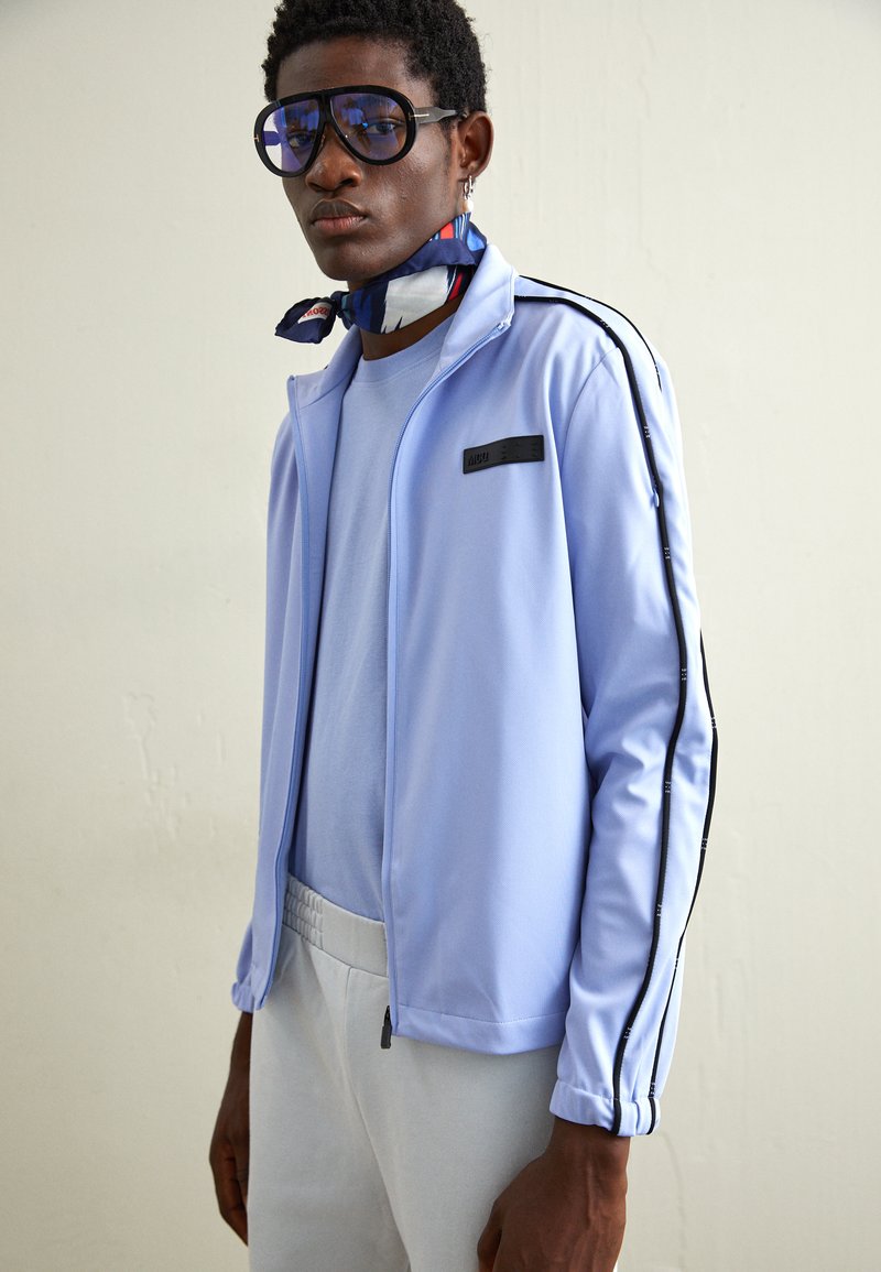 McQ Alexander McQueen JACKET TRUCK SUIT Training jacket hyperlilac