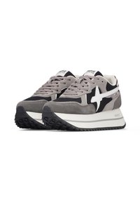 Pair of grey, black, and white sporty sneakers with textured soles and star-shaped side logos, displayed against a white background.