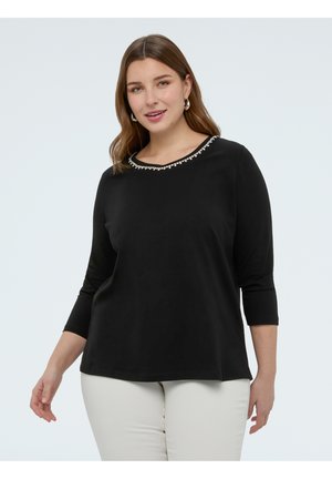 - Bluzka z długim rękawem