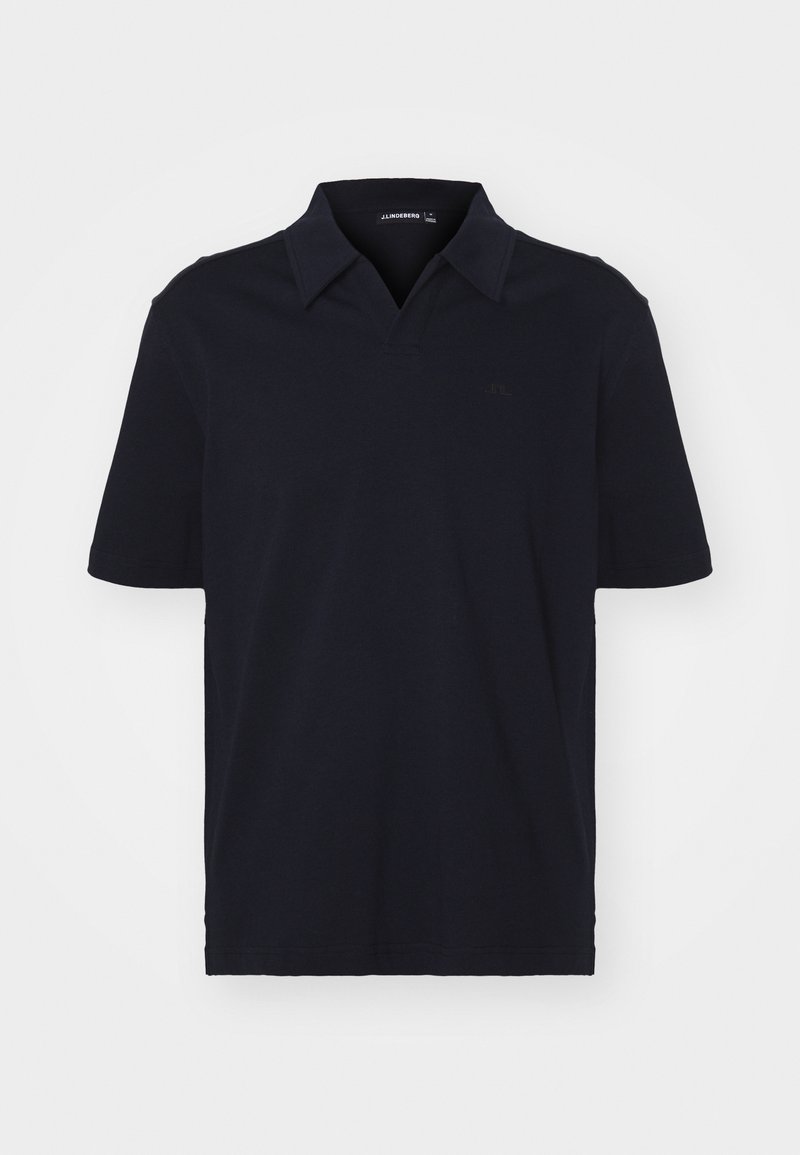 Marinblå kortärmad polo t-shirt tillverkad av bomull, med klassisk krage och en diskret logotyp på bröstet. Slät textur, normal passform.