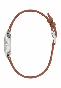 Montre bracelet argentée ronde avec un bracelet en caoutchouc marron, arborant un design minimaliste et un mécanisme de fermeture simple.