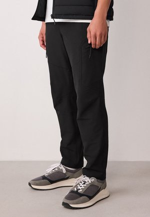 Next, SLIM FIT - TECH STRETCH UTILITY - Püksid - black