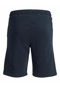 Shorts en coton bleu marine avec une taille élastique, présentant une texture lisse et un design simple. Conviennent pour une tenue décontractée.