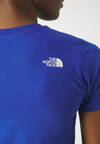 The North Face W SS SD SLIM TEE - Paprasti marškinėliai - blue