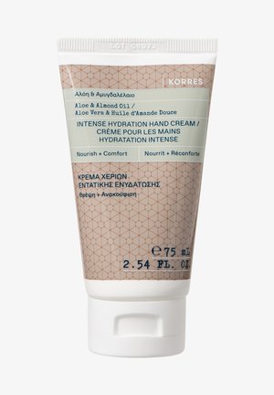 ALOE & ALMOND OIL INTENSIVELY MOISTURIZING HAND CREAM - Hand cream - -