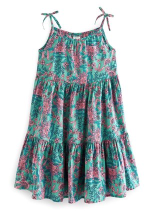 Robe florale avec un fond teal, présentant des motifs roses et bleus, des bretelles ajustables à nouer, et une jupe en tiers avec un design froncé.