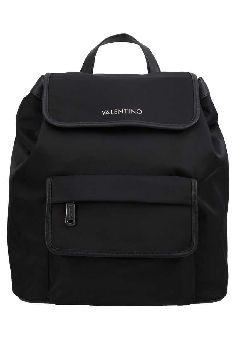 Black nylon backpack with a flap closure, featuring a front pocket with zipper, and logo on the upper front. Textured surface, minimalist design.