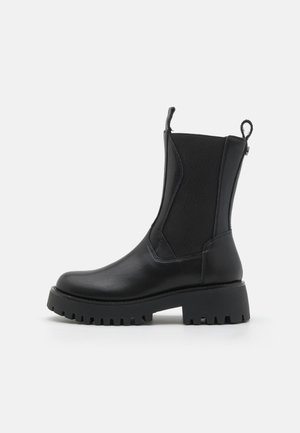 DISCLOSE - Platform ankle boots - black