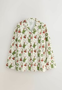 Maglietta da pigiama a maniche lunghe bianca con decorazioni festose in verde e rosso, inclusi alberi di Natale e ghirlande. Tessuto in cotone, chiusura a bottoni.