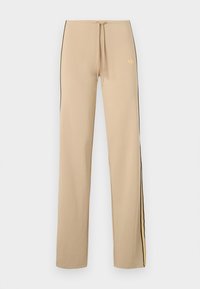 Μπεζ φόρμα με μαύρες πλευρικές ρίγες και κίτρινες λεπτομέρειες. Διαθέτει ρυθμιζόμενο κορδόνι στη μέση και διακριτικό λογότυπο στην επάνω αριστερή πλευρά.