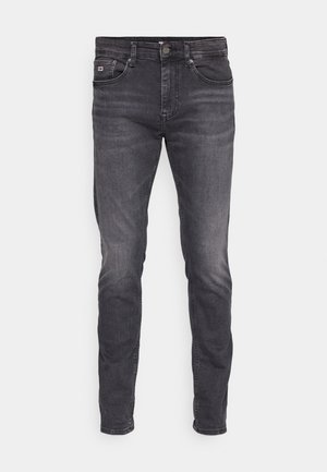 Jean en denim noir avec un design slim fit, présentant une fermeture à bouton à l'avant, cinq poches et un léger décoloration sur le tissu.