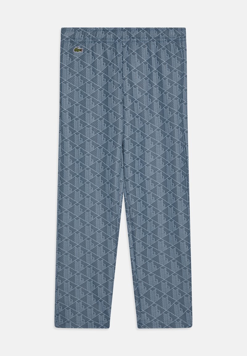 Pantaloni blu con motivo geometrico ripetuto, vita elasticizzata e piccolo logo sulla parte superiore sinistra.