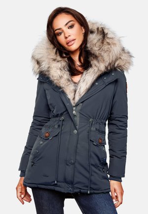 Navy puffer jacket with a fur-lined hood, drawstring waist, and two front pockets. Features button accents and a zip closure.