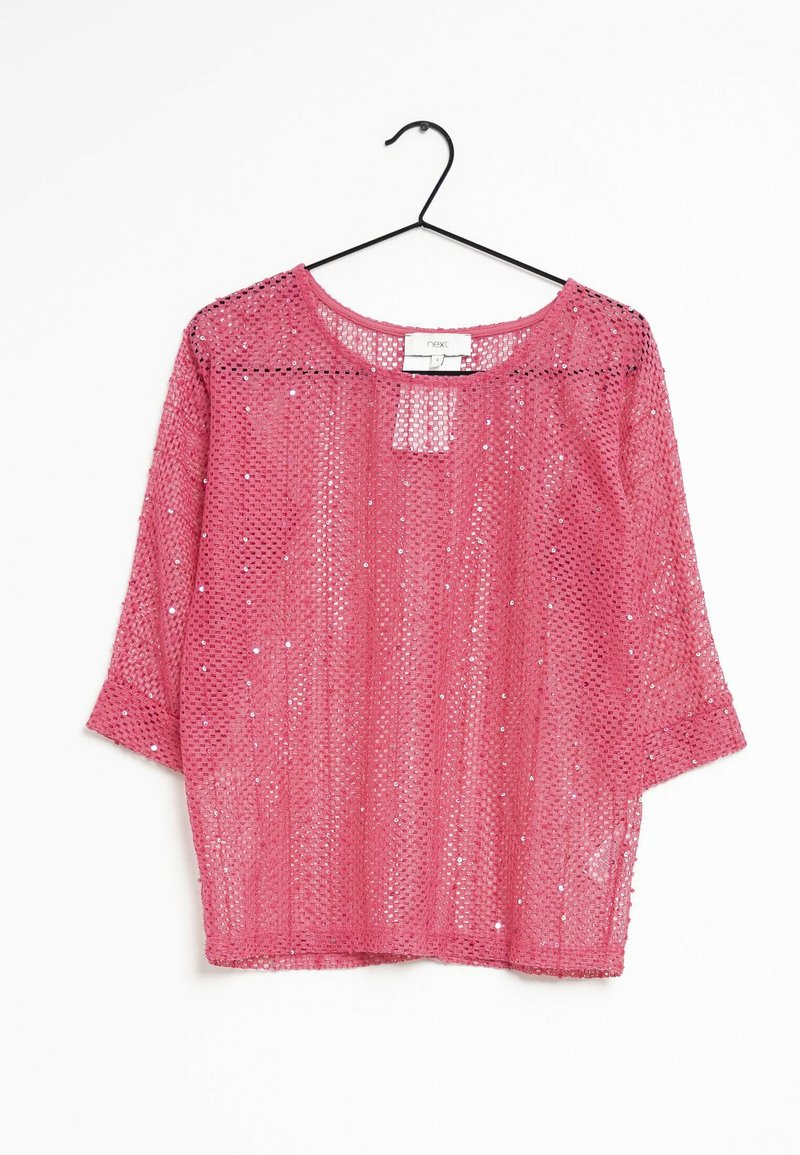 Rosa, lockere Bluse aus offenem Strickmaterial mit subtilen metallischen Akzenten, Rundhalsausschnitt und drei Viertelärmeln.
