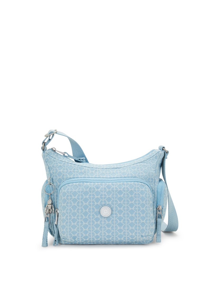 Light blue shoulder bag made of textile with a geometric pattern, featuring a main compartment, front pocket, tassel accent, and adjustable strap.
