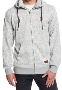 Szara bluza z kapturem na zamek, o drobnym wzorze, z sznurkiem, kieszeniami z przodu oraz brązową skórzaną metką na dole. Posiada luźny krój.