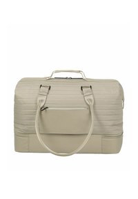 Sac de sport beige à structure souple avec texture matelassée, poignée supérieure, bandoulière, poche avant zippée et compartiment zippé au fond.