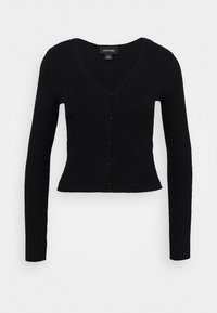 Svart ribbad cardigan med långa ärmar, V-ringning och sex svarta knappar. Kort modell med ett texturerat stickat material.